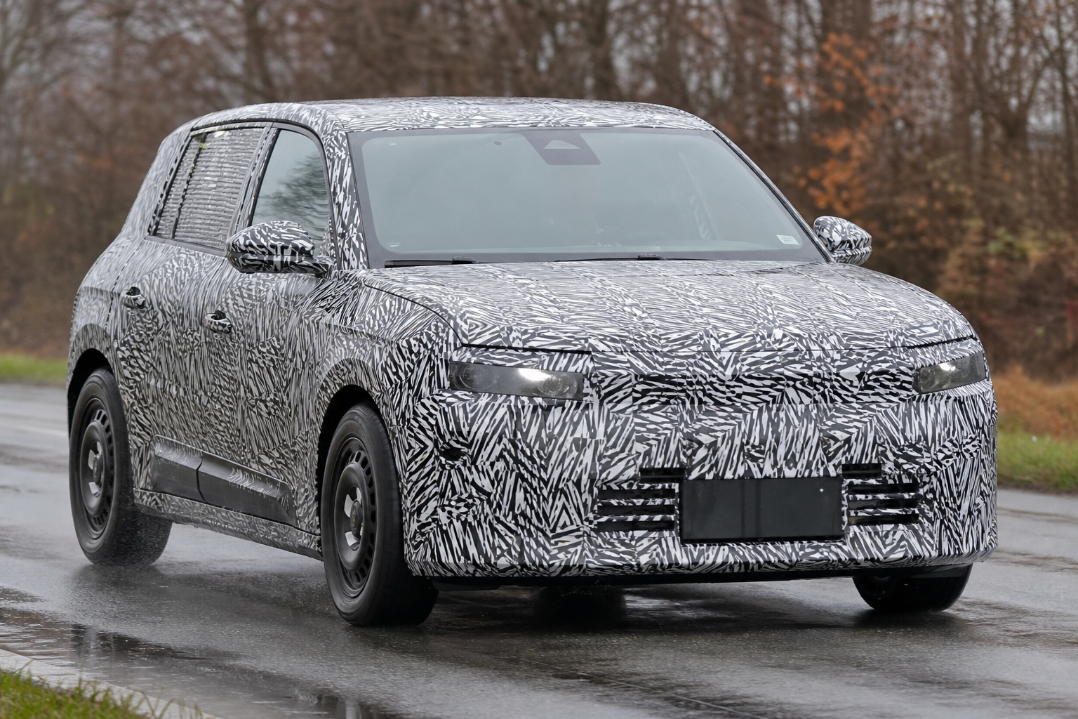 Next peugeot e 208 spied with boxier design and new stla one platform
